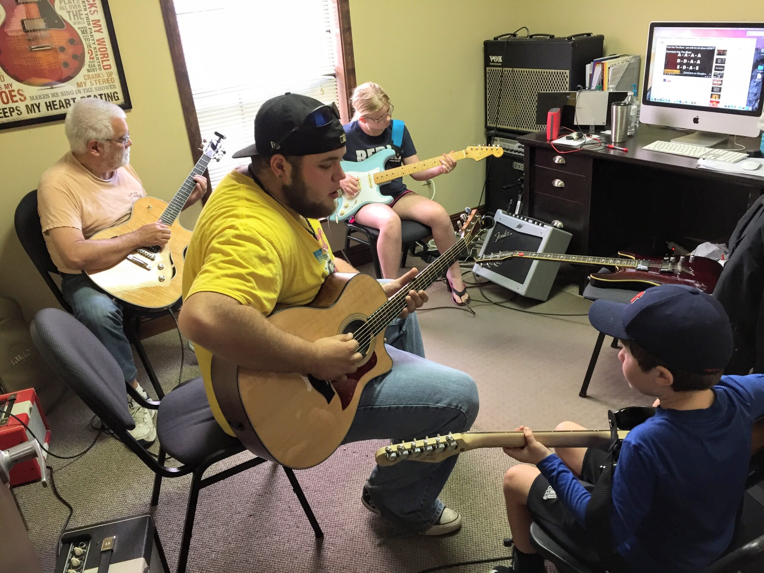 Kid Learning Guitar